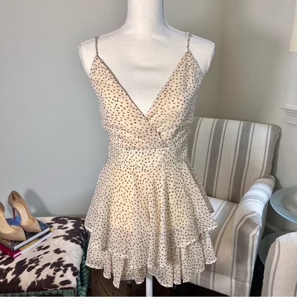 Neutral printed romper with flounce skirt from Red Dress Boutique - Picture 3 of 9